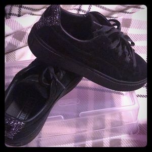 Black Puma suede shoes